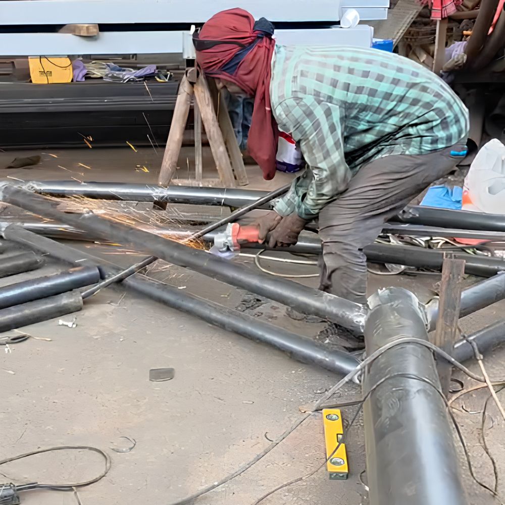 Steel pipe fabrication and cutting for custom carport and pergola structures in the UAE