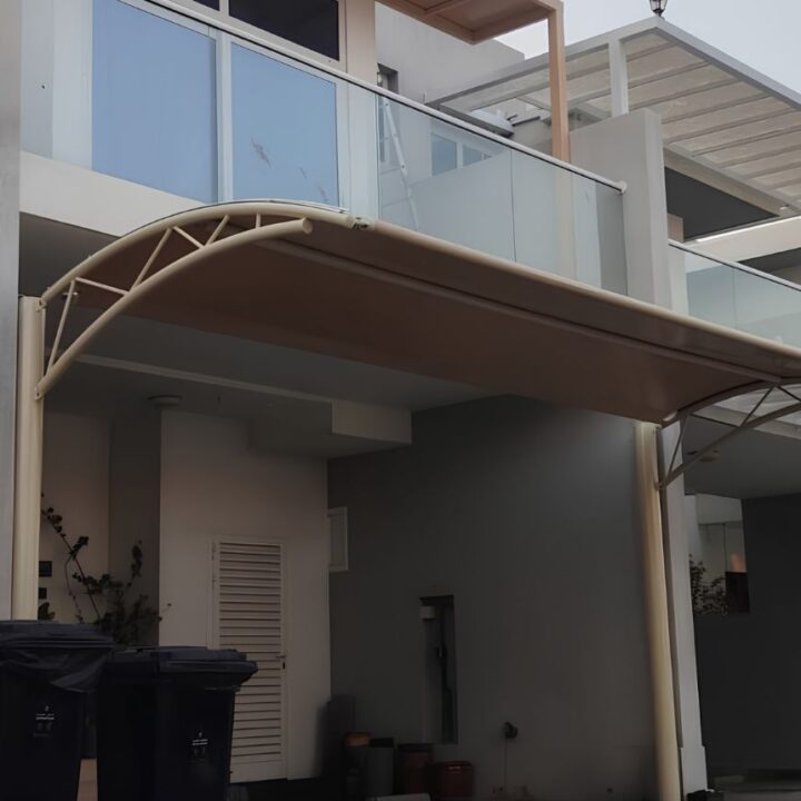 Residential car parking shade canopy installed for a villa driveway in Damac Hills 2